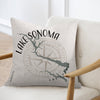 Light beige pillow with Lake Sonoma map and compass design.
