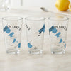 Three clear glasses featuring a compass rose, blue lake outlines, and "Madison Lakes Wisconsin" text.