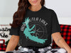 Black t-shirt featuring Arkabutla Lake outline and compass with text.