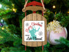 Sled ornament with "Merry Christmas From Lake Pleasant" and snowflakes on a Christmas tree.