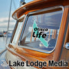 Otisco Life graphic on a boat window, part of Lake Lodge Media branding.