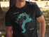 Black t-shirt with "Lake Pend Oreille IDAHO" map graphic and compass.