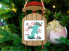 Sled ornament from Canobie Lake with "Merry Christmas" text and snowflakes.