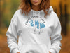 White hoodie with "Choke Canyon Lake Texas" design featuring a blue map outline and compass.