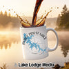 White mug with Percy Priest Lake map and compass design, coffee pouring.