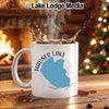 White mug with Hauser Lake, Idaho map graphic and steam.