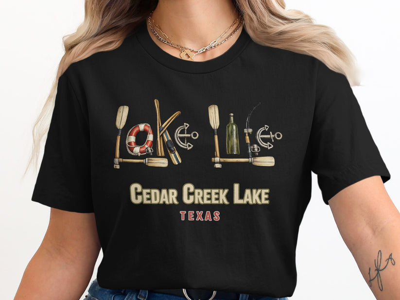 Black t-shirt with Cedar Creek Lake, Texas graphic featuring nautical items.