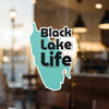 Turquoise lake outline sticker reads "Black Lake Life" with copyright Lake Lodge Media LLC.
