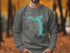 Grey sweatshirt with Lake Lotawana map graphic and compass rose.