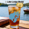 Glass with iced tea, lemon slice, and blue lake map design.