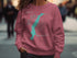 Pink sweatshirt with "Beautiful Lake Washington" text and compass rose design.