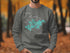 Gray sweatshirt with a blue Lake Minnetonka map and compass rose graphic.