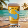 Beer glass on a beach with "JOKS AND HESS LAKE MICHIGAN" text and blue Michigan outline.