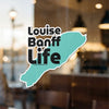 Sticker with text "Louise Banff Life" over a turquoise shape.