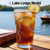 Glass of iced tea with a lemon slice, featuring a "Newall Jackson Lake" design.