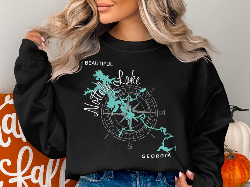 Black sweatshirt with "Natty Lake Georgia" and a compass rose design.