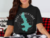 Black t-shirt featuring West Okoboji Lake outline and compass design.