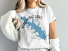 White t-shirt with blue map of Waurika Lake, Oklahoma and compass graphic.
