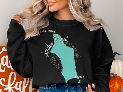 Black sweatshirt with teal Jordan Pond map and compass graphic.