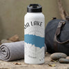 White water bottle with "DA LAKE" text and compass design.