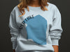 Light blue sweatshirt with 'Red Lake Minnesota' text and lake graphic.