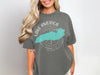 Dark grey t-shirt with "Lake America" design featuring a teal map and compass.