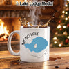 White mug with Mono Lake map and compass graphic, steam rising.
