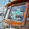 "Big Chapman Life" sticker on a boat window, with "Lake Lodge Media" logo below.