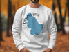 White sweatshirt with Ossipee Lake, New Hampshire map and compass graphic.
