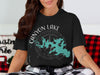 Black t-shirt with Canyon Lake Texas map and compass graphic.