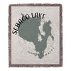 Woven blanket with Sebago Lake map, compass rose, and "MAINE" text.