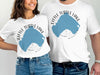 White t-shirts with "Little Turtle Lake Minnesota" and blue lake shape graphic.