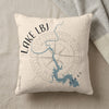 Pillow with Lake LBJ map graphic and compass rose in blue and gray on cream.