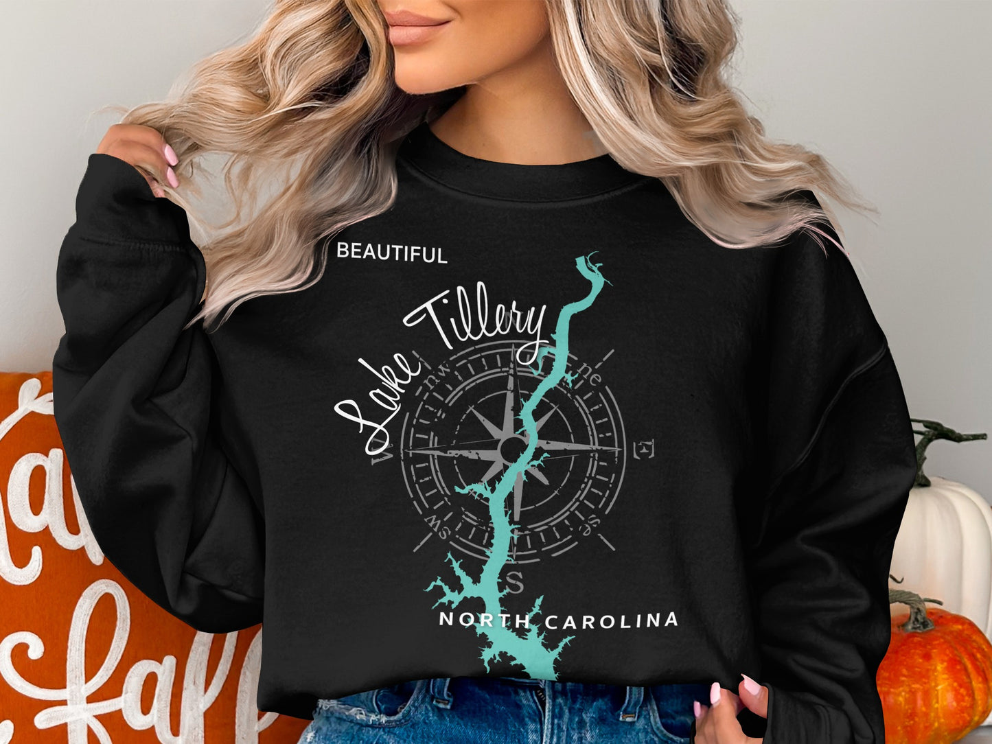 Black sweatshirt with "Beautiful Lake Tillery North Carolina" and compass graphic.