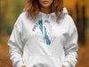 White hoodie with "Pavlas Lake Wisconsin" and a blue lake map design.