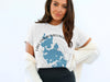 White t-shirt featuring a map of Lake Chaubunagungamaug, Massachusetts with compass rose.