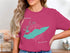 Pink t-shirt with "Lake Erie" and compass design featuring Michigan outline.