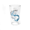 Clear glass pint glass with Spoon Lake map and compass rose design.