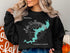 Black sweatshirt with "Lake Wallenpaupack Pennsylvania" and compass rose design.