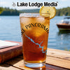 Glass of iced tea with a lemon slice, decorated with compass and lake map.