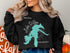 Black sweatshirt with "Lake Dillon Colorado" and a compass graphic.