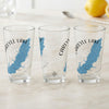 Three clear glasses feature a blue map of Carlyle Lake and compass rose graphic.