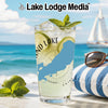 Glass of lemonade with lime and mint, lake graphic, beach background, sunglasses.