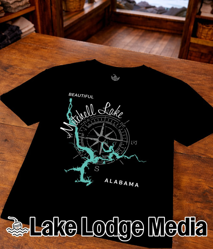 Black t-shirt with map of Mitchell Lake, Alabama and compass rose.