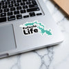 Eufaula Life sticker featuring a teal lake outline over a laptop.
