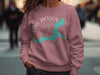 Rose crewneck sweatshirt with "Lake Jackson Georgia" and compass graphic.
