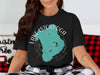 Black t-shirt with turquoise Lake Istokpoga outline and compass rose graphic.