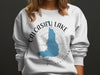 Calcasieu Lake Louisiana map design on a white sweatshirt.