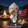 Glass with ice cream and coffee, Texas map, campfire, and s'mores ingredients.
