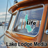 Turquoise Keechelus Life sticker on a boat window, "Lake Lodge Media" text below.
